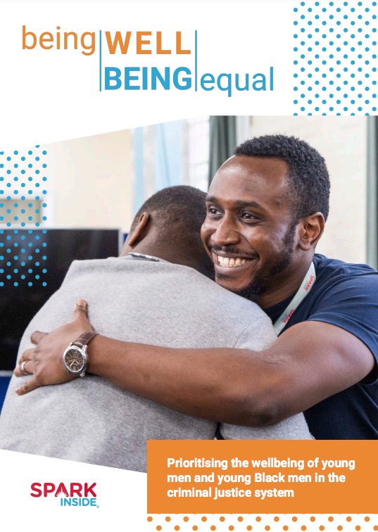 Report cover showing two black men embracing